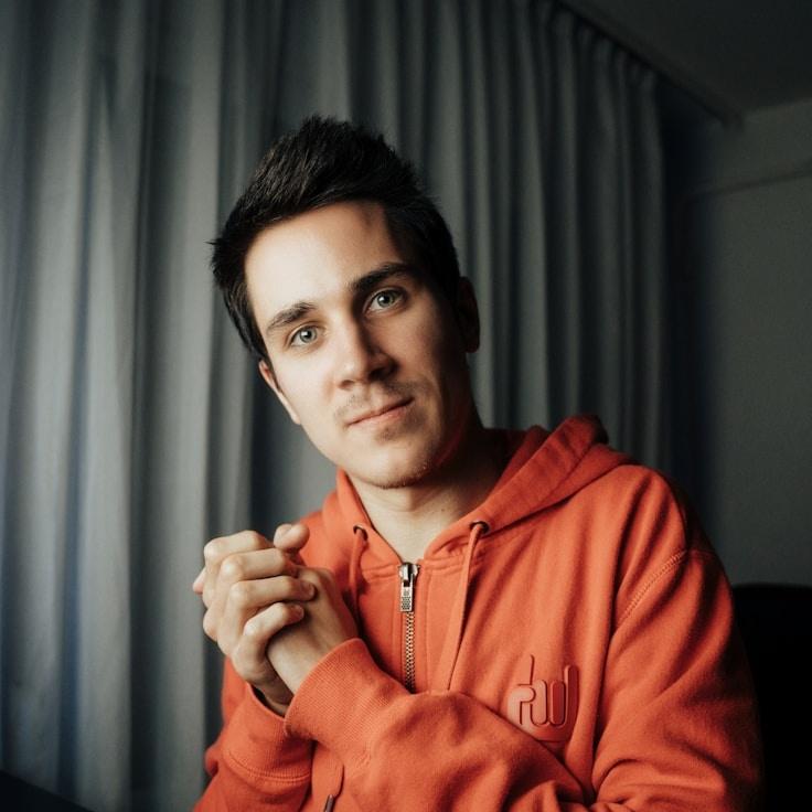 New name, Lead Design Curator at StoneMossCipher, reviewing corporate floral arrangements